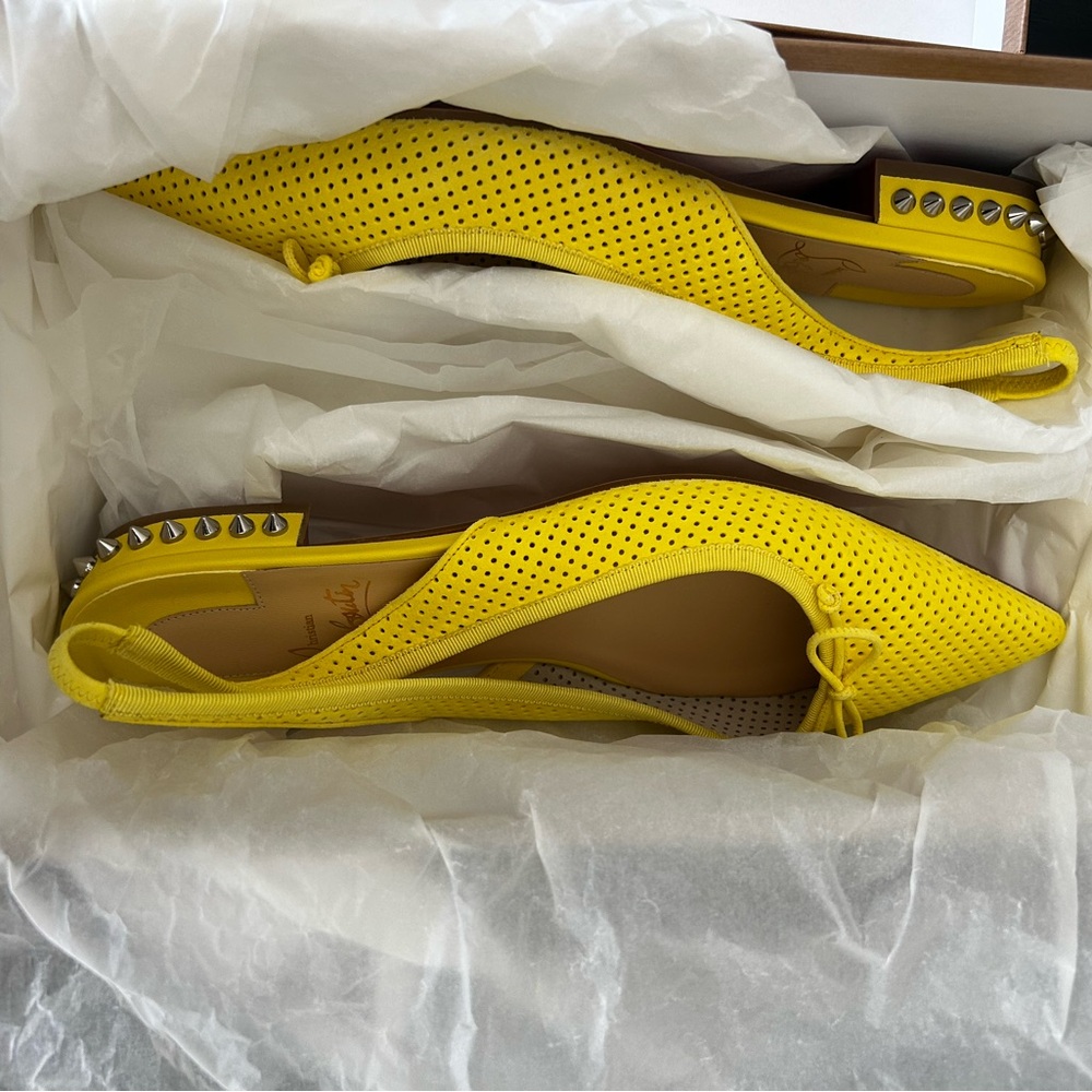 Christian Louboutin Yellow Flats with Perforated Design